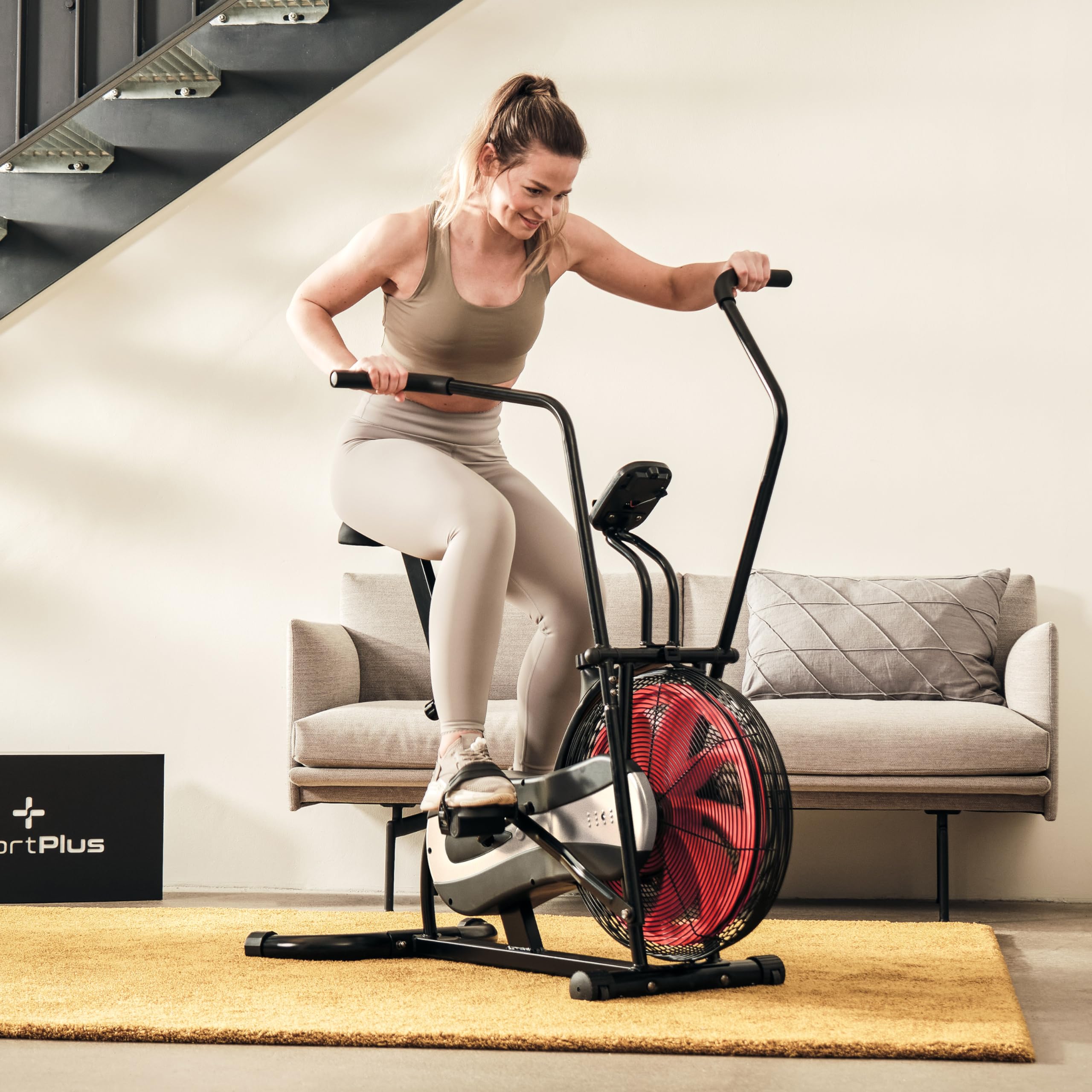 SportPlus Air Bike mit Luftwiderstand und Riemenbremssystem - effizienter HIIT Heimtrainer für Arme und Beine, mit Trainingscomputer, sicher & stabil bis 100kg, kompakte Maße, SP-FB-1000